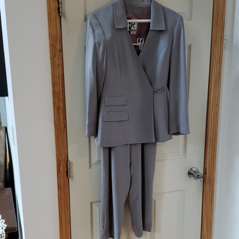 Grey pants suite.  2 piece. Side buckle jacket.